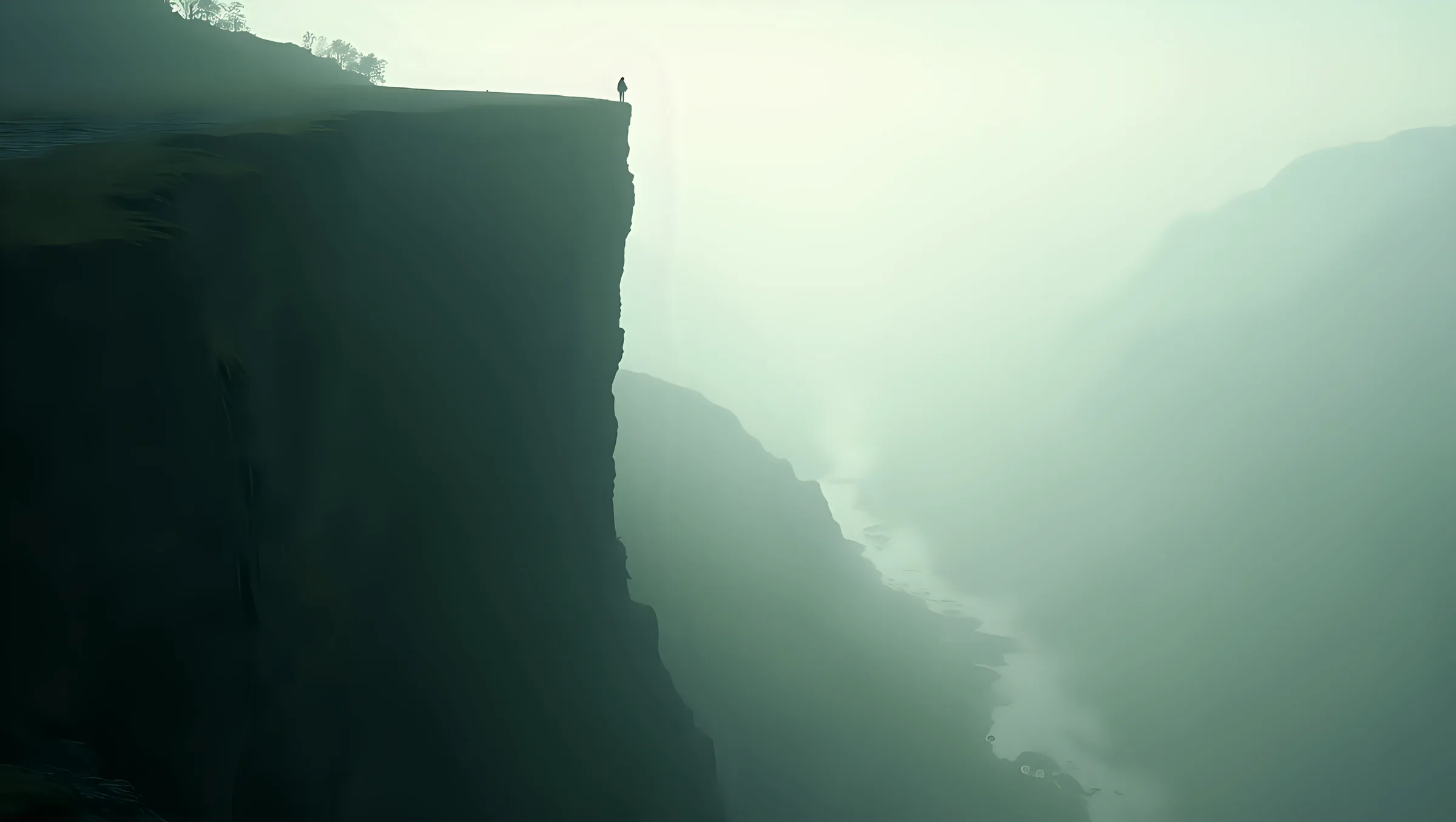 A desaturated, high-contrast photograph of a mountain ridgeline, a valley falling away beneath it, graded to the brand's forest and stone tones.